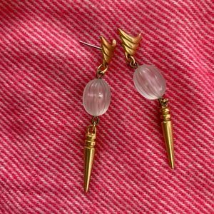 Gold metal earrings with a clear bead. Pierced.